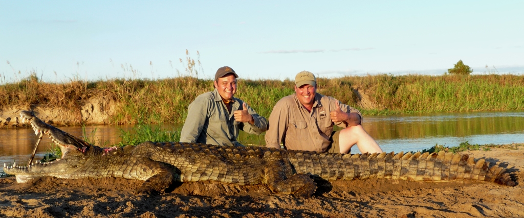 It had not been an easy hunt, the wind wasn’t perfect and the day had been long. Numerous Crocs had been seen, two of them meeting the requirements we were after, but nothing had come from endless patience. We had given up, called it a day, and then no more than a mile from our landing site there he was. Jeff made another telling shot – this time at 70 yards off sticks – and if you’re thinking what’s the big fuss at 70 yards? Go try hitting the centre out of an Oreo cookie at 70 yards without a dead rest. It’s tough!