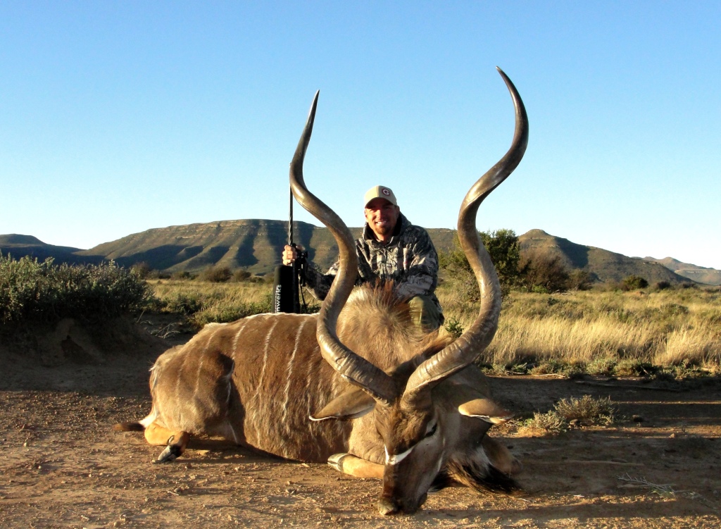 And our old friend, Kregg Thomassen, joined me for his third trip back at John X Safaris. He had made a true “hog” of himself when it comes to big East Cape Kudu on both his previous hunts, scoring with a top 5 Kudu of a lifetime on his second hunt. That bull was a particularly narrow bull; this time around he lucked into another monster at 450 yards. The trackers now refer to him as; “Kudu King”, and his rifle as “The magic stick”!