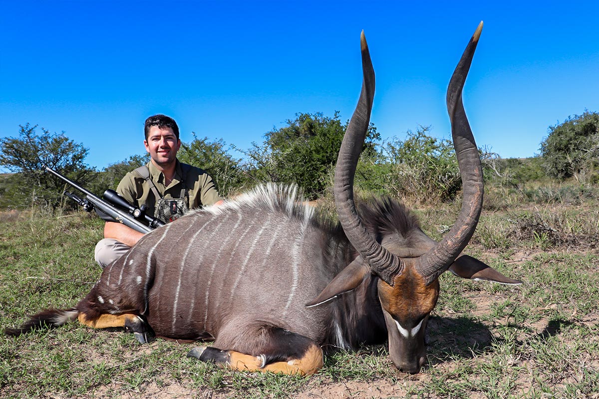 Larence Feuer on safari with John X 5
