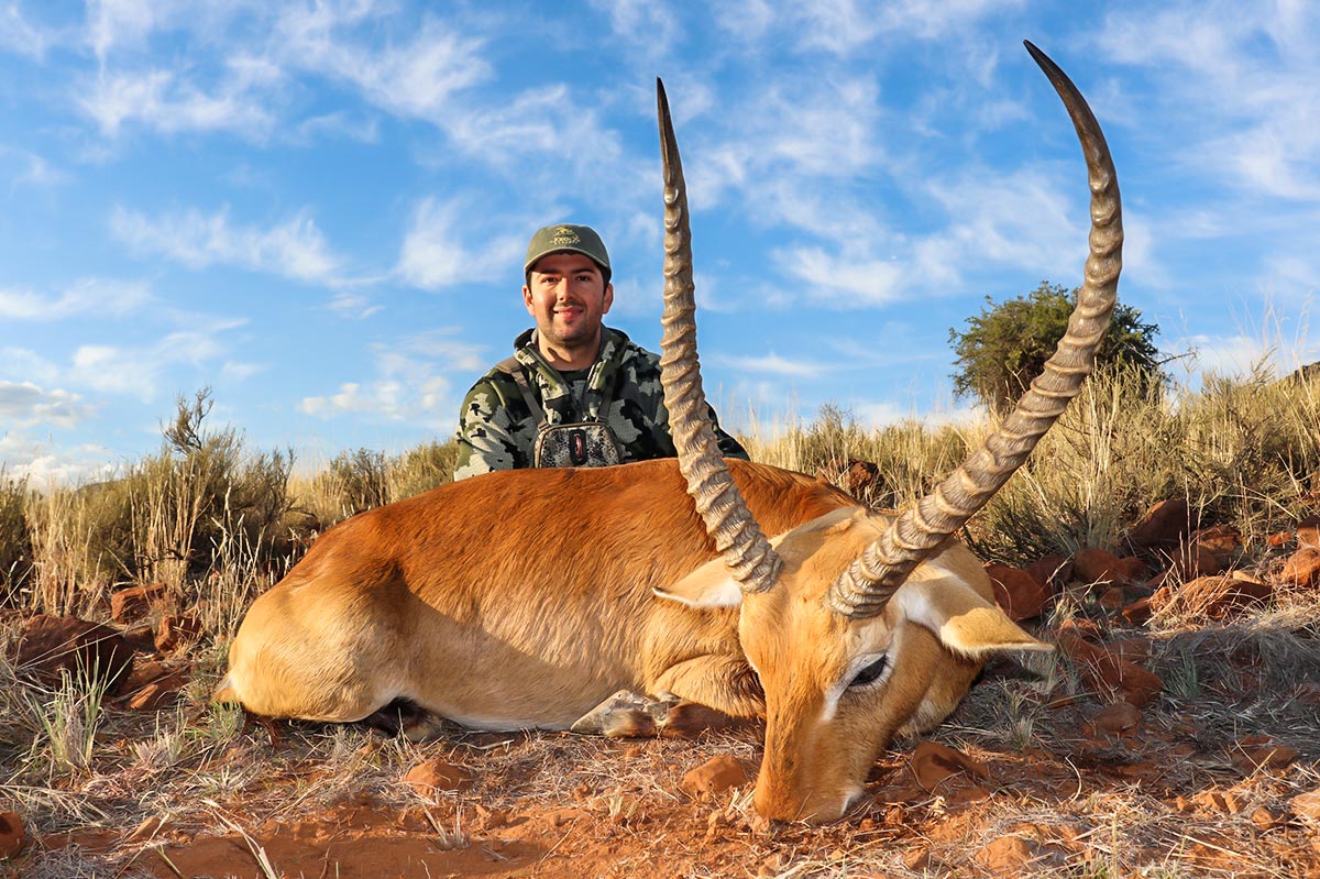 Larence Feuer on safari with John X 7