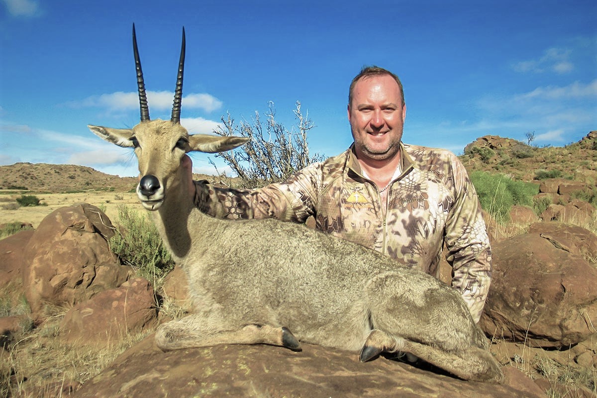 George Gibson hunting with John X 6