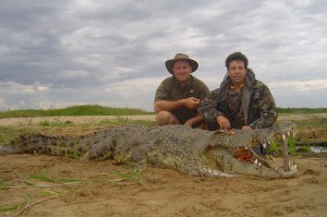 Rick and Gary with an impressive Croc on the Mighty Zambezi River!
