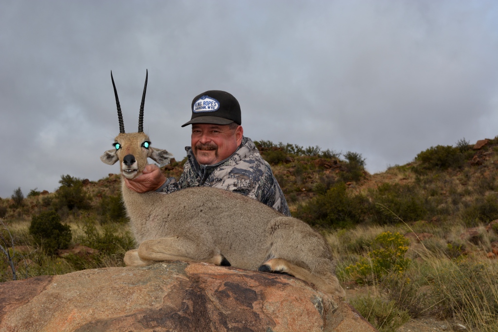 And one round is all it took. At 400 yards the ram dropped out of sight and earned the awe of both hunter and guide. Lee's ram was one magnificent specimen, well over the 8" class, a trophy to be proud of and a shot to be remembered.