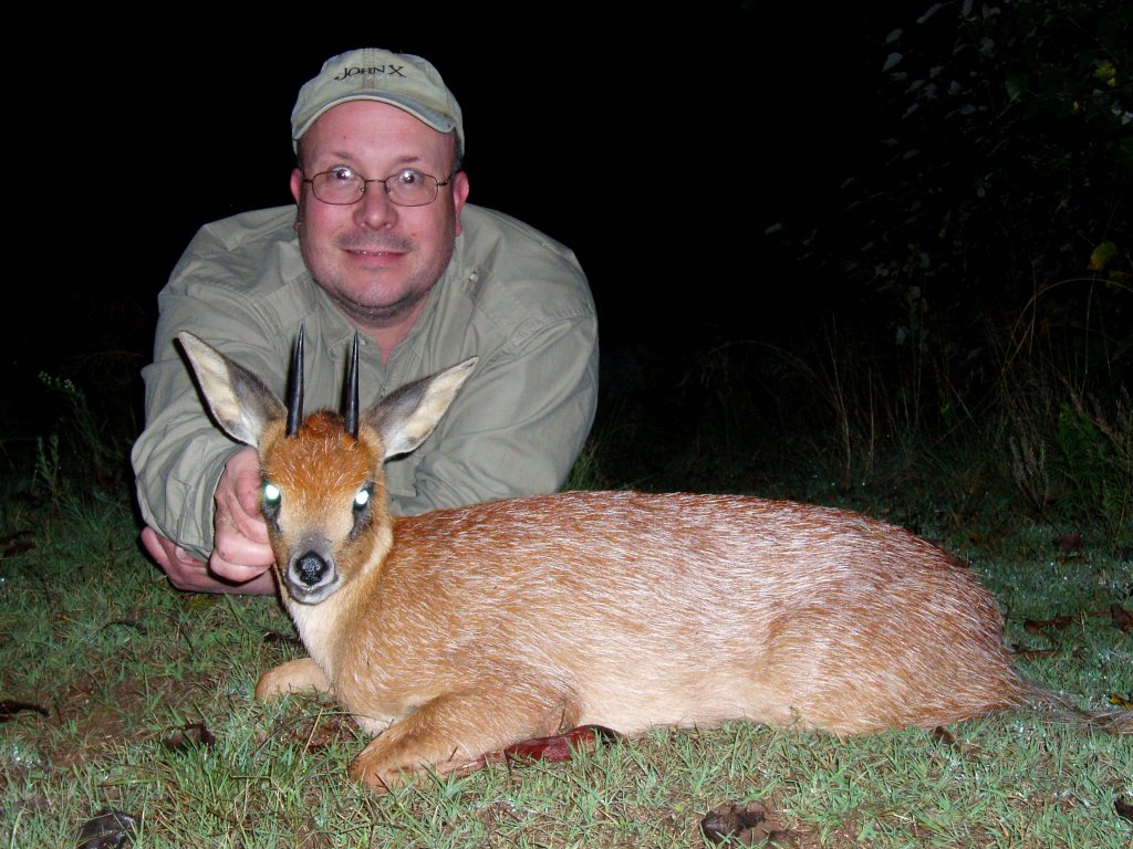 Last, but certainly not least sees Brett finally getting his much anticipated Cape Grysbuck. For most his trophy will be seen as just another one of those 'Duikers", never looked at in the same light as say a Kudu or Cape Buffalo, but for those expwerienced hunters who've spent many hours in pursuit of the Tiny 10 - they'll know just what Brett has done again. Last time it was his Vaal Rhebuck, this time his awesome Cape Grysbuck. Eat your hart out, we all are!