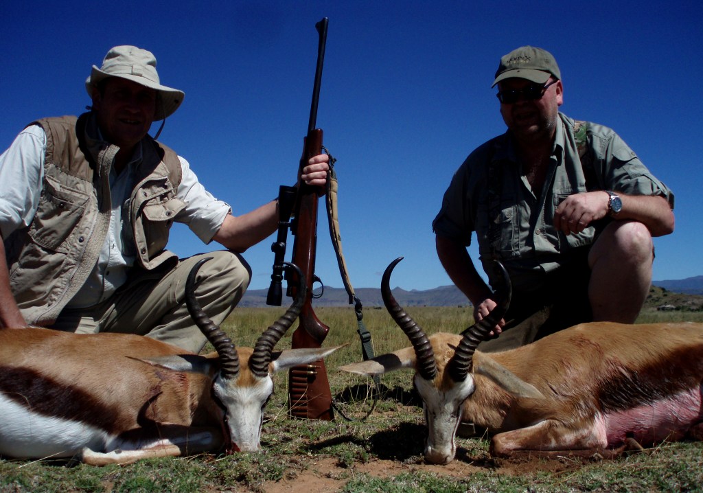 OLYMPUS DIGITAL CAMERA John X Safaris