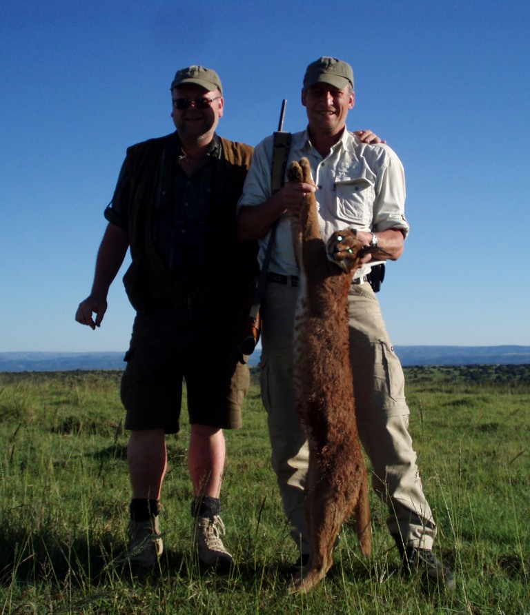 OLYMPUS DIGITAL CAMERA John X Safaris